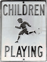 Embossed childeren playing sign from the 50’s
