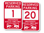 Red Reserved Parking Spot Signs