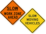Slow Vehicle Signs