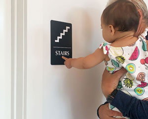 Braille stairs sign in black