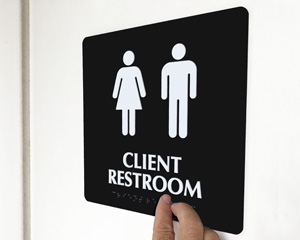 Customized restroom sign
