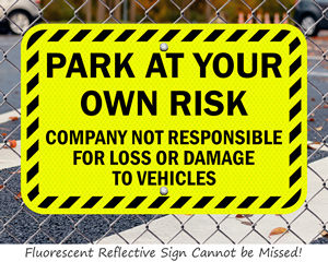 Fluorescent park at your own risk sign