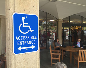 Accessible entrance sign