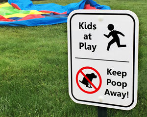 No dogs in playground signs