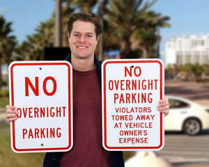 No overnight parking towed away signs
