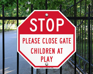 Child at Play Playground Sign