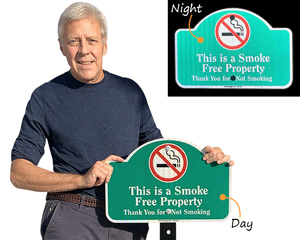 Reflective smoke free property sign