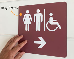 Restroom sign with arrow