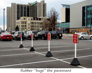 Rubber sign bases for parking lot