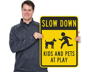 Slow children playing MPH signs