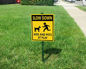Slow Down LawnBoss Sign