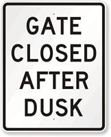 GATE CLOSED AFTER DUSK Sign