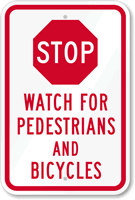 Stop   Watch For Pedestrians And Bicycles Sign