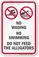 No Wading, Swimming or Feeding Alligators Sign