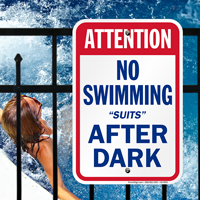 Attention No Swimming Suits After Dark Signs