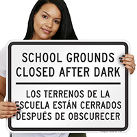 Bilingual School Grounds Closed After Dark Sign