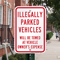 Illegally Parked Vehicles Towed Signs