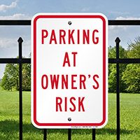 PARKING AT OWNER'S RISK Signs
