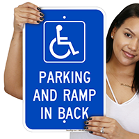 Parking And Ramp In Back With Graphic Signs