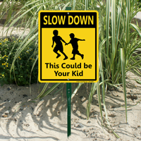 Slow Down LawnBoss Sign With Kids running Graphic