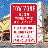 Tow Zone, AsSignsed Parking Spaces On Premises Signs