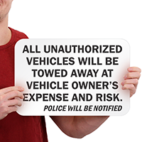 All Unauthorized Vehicles Towed Signs