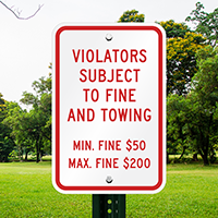 Violators Subject To Fine Towing Signs