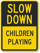 Slow Down - Children Playing Sign
