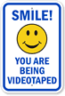 You Are Being Videotaped with Smiley Sign