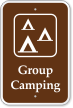 Group Camping with Graphic Campground Sign