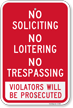 No Loitering, Soliciting, Violators Will be Prosecuted Sign