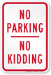 No Parking No Kidding Sign