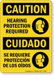 Bilingual OSHA Caution Hearing Protection Required Sign
