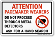 Do Not Proceed Through Metal Detectors Sign