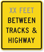 Custom Feet Between Tracks & Highway Sign
