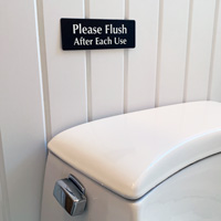 Please flush after each use bathroom sign