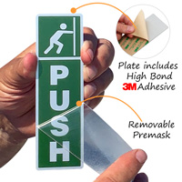 Push door sign with a protective premask