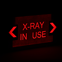 X-Ray In Use - Red Lettering, White Background