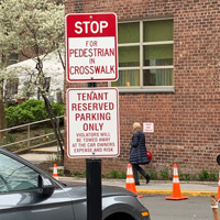 Stop for pedestrian in crosswalk sign