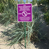 Bilingual LawnBoss Sign for Water Conservation