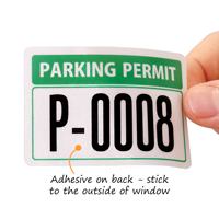 Reflective Parking Permits Outside of Car Window