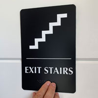 Exit stairs sign with braille