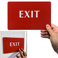 Braille exit sign in red