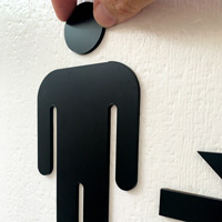 Routed acrylic men’s and women’s room signs with arrows