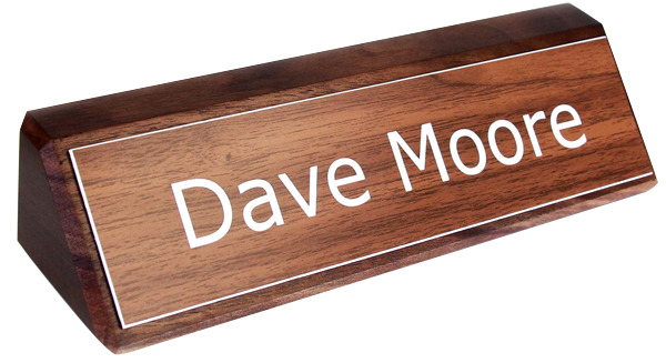 Your engraved nameplate sits proudly on your desk or office.